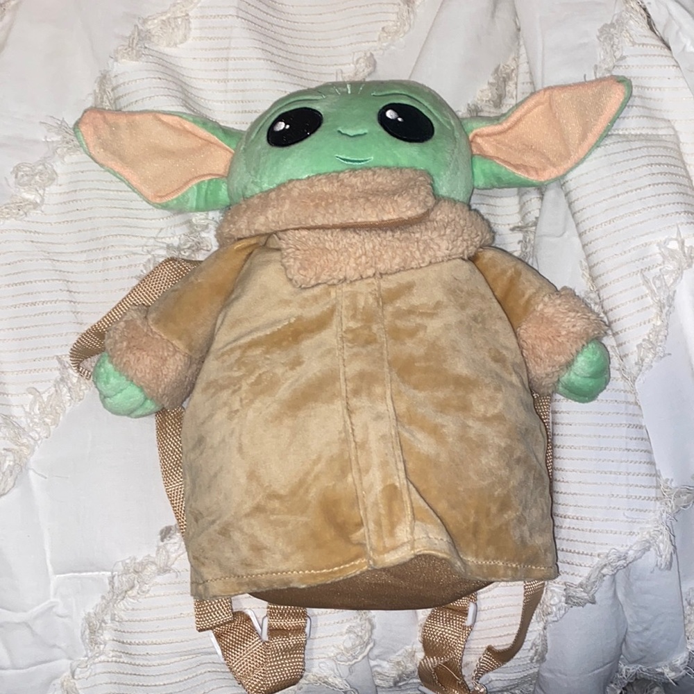 Only used once baby yoda plush bag